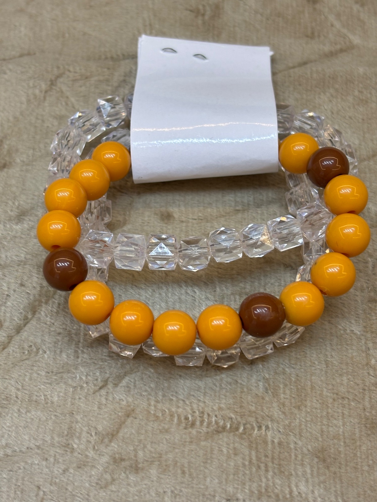 PUL0071 - Mix de Pulseiras Mostarda/Marrom com Contas Geométricas Transparentes