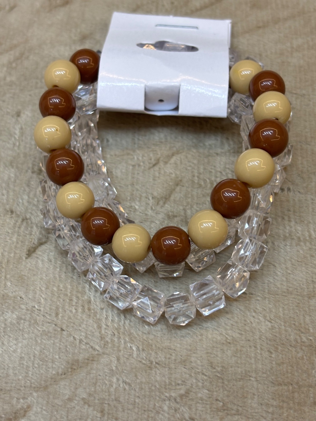 PUL0072 - Mix de Pulseiras Bege/Marrom e Contas Geométricas Transparentes