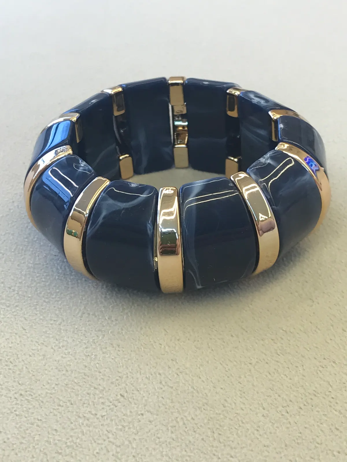 PUL0016 - Pulseira Elástica Azul Marinho com Detalhes Dourados